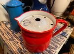 rood emaille melkkoker